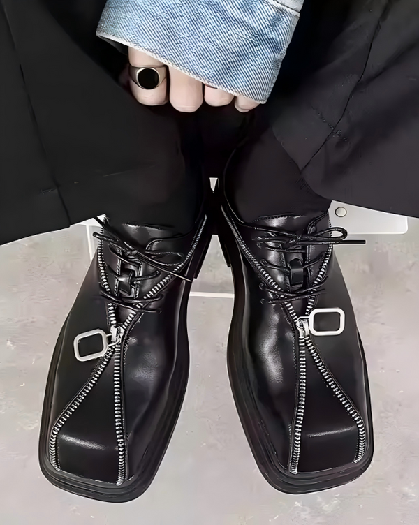Black zip-detail square-toe shoes, top view showing front zips