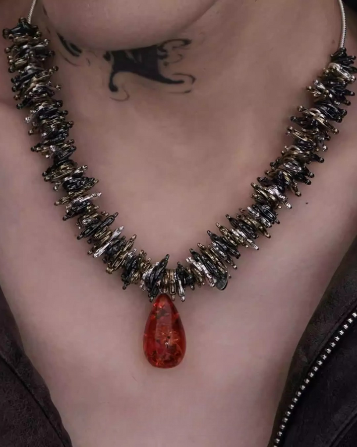 Lifestyle styling view of Gothic Beaded and Star Statement Necklace Set