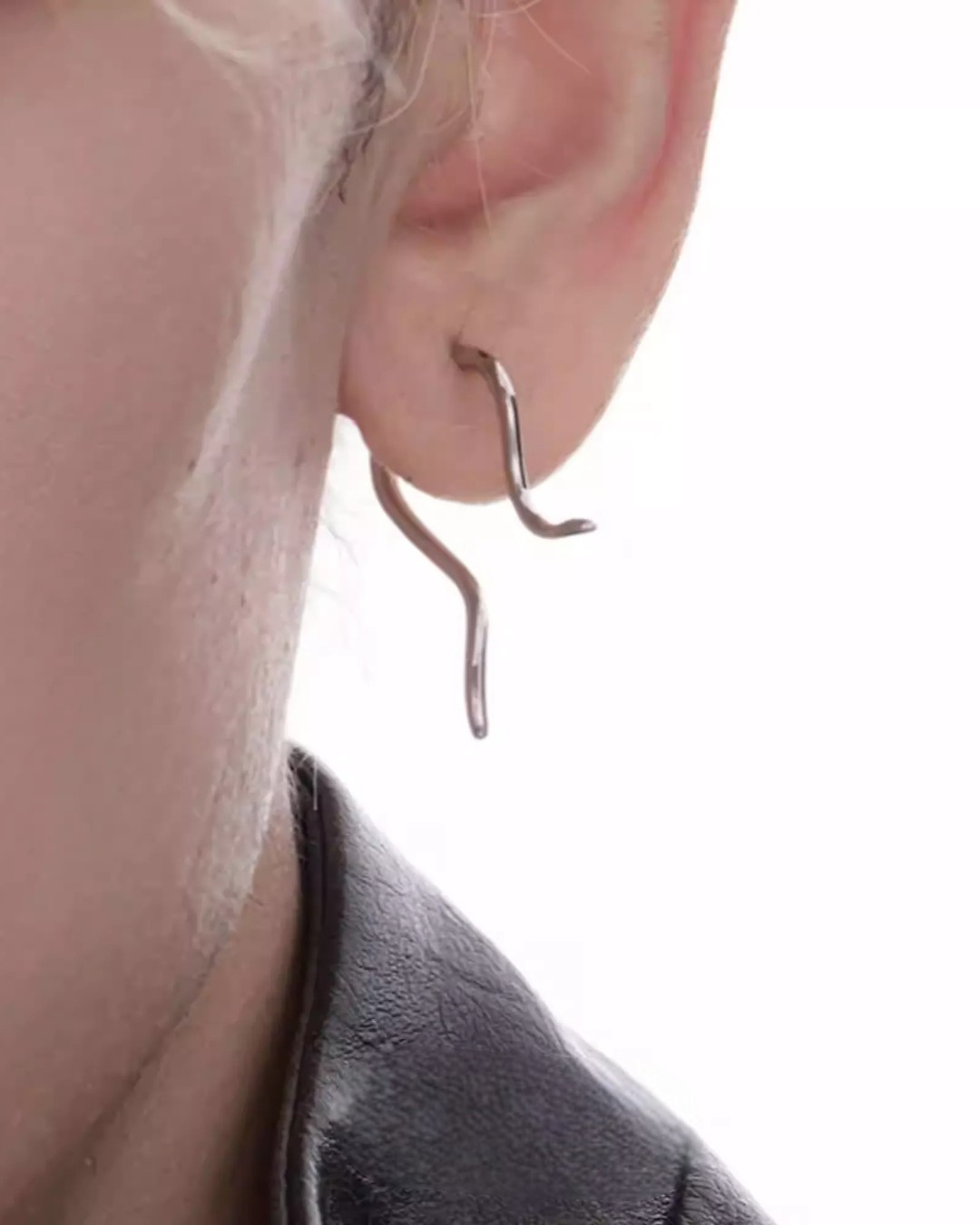 Close-up detail of Minimalist Silver Hoop and Drop Earrings