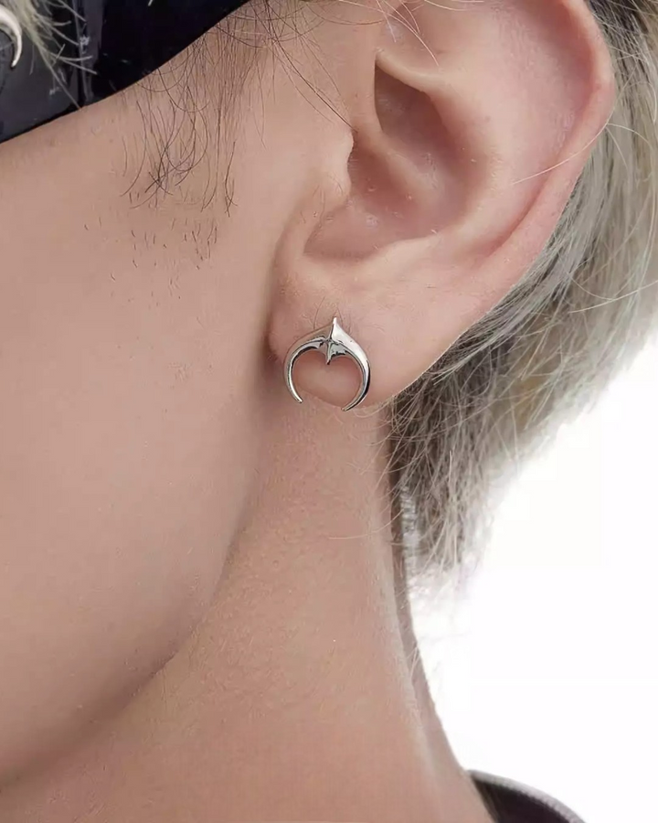 Lifestyle styling view of Minimalist Silver Hoop and Drop Earrings