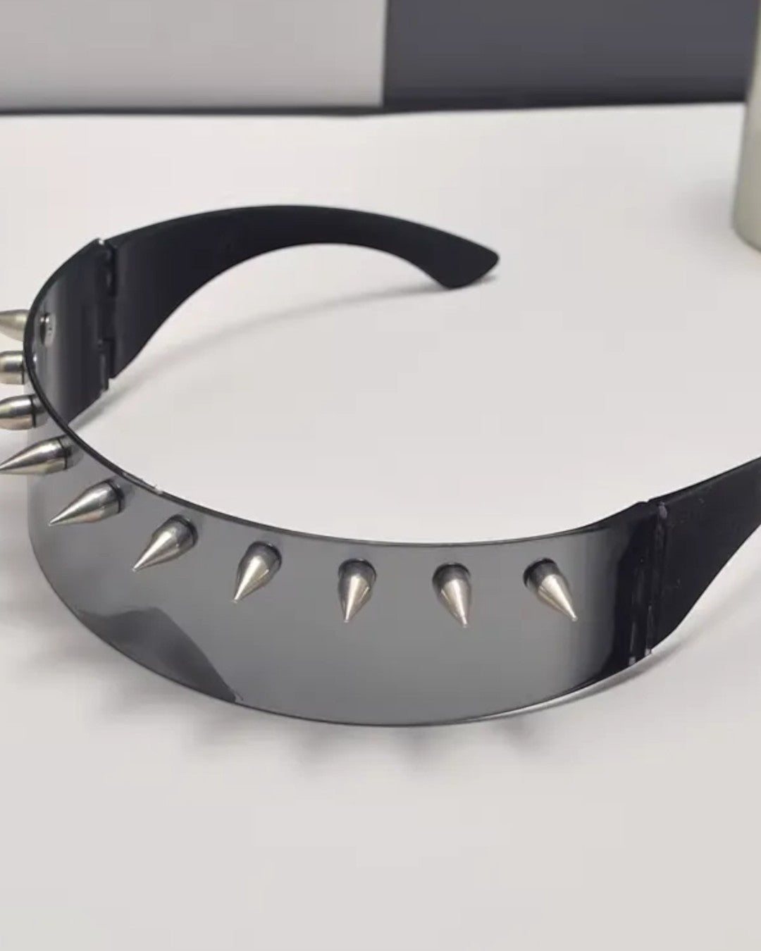 Close-up detail of Spiked Wrap-Around Sunglasses