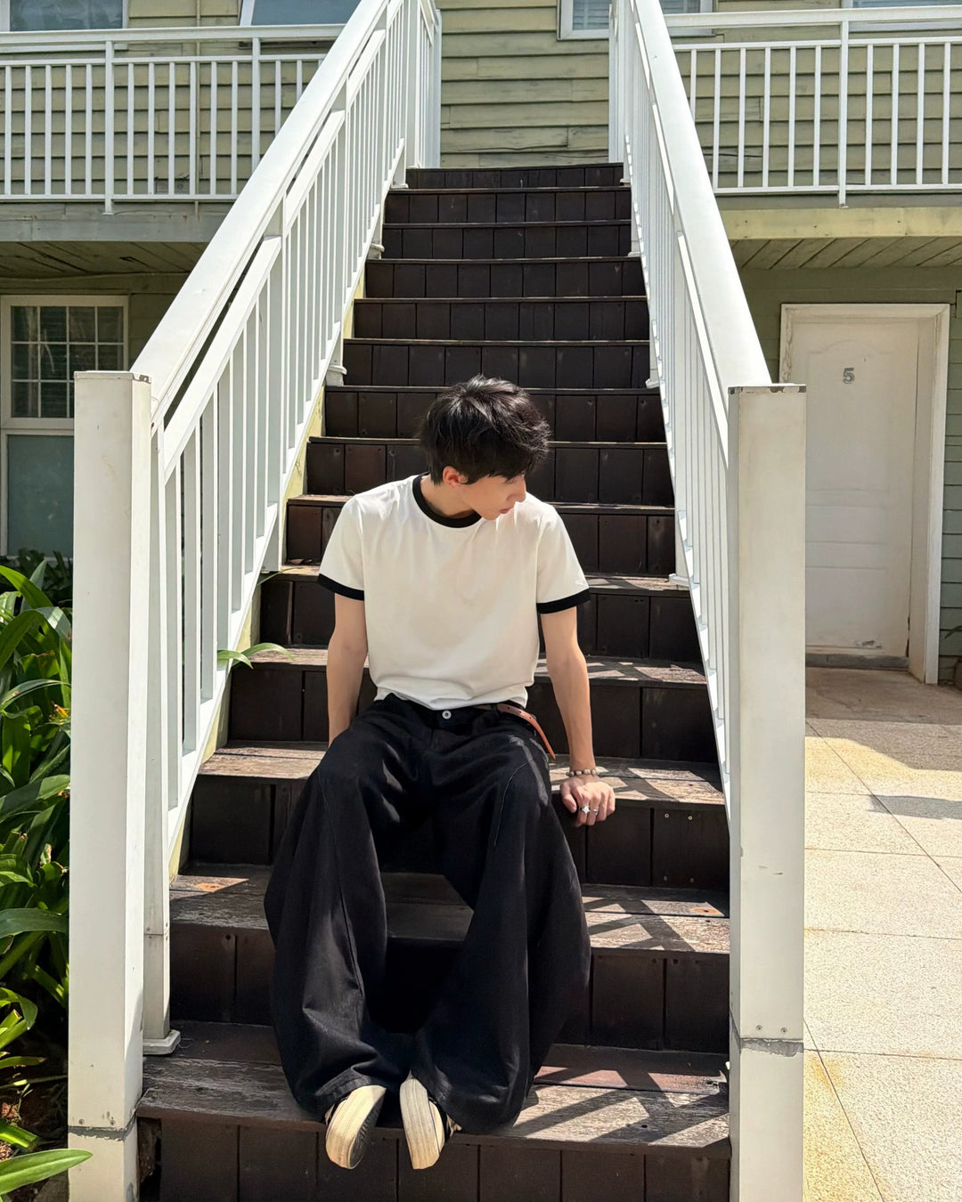 Lifestyle styling view of Black Trim White Oversized T-Shirt