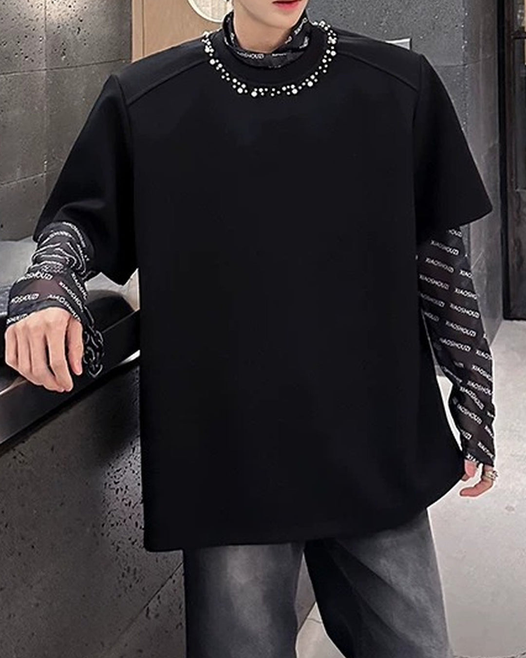 Close-up detail of Oversized T-Shirt with Chain Neck Detail
