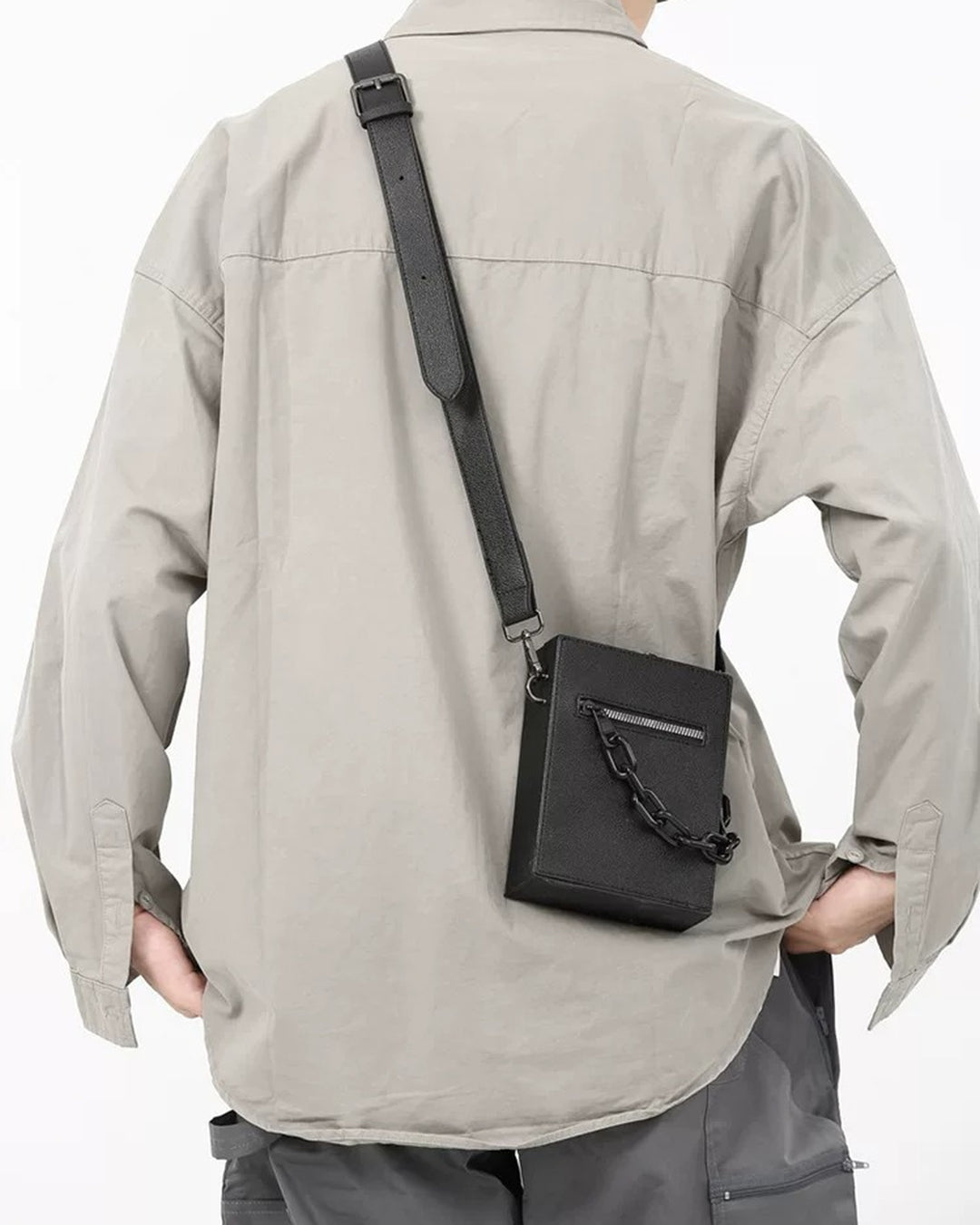 Lifestyle styling view of Mini Textured Crossbody Bag with Chain