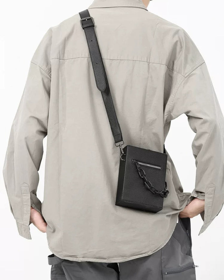 Lifestyle styling view of Mini Textured Crossbody Bag with Chain