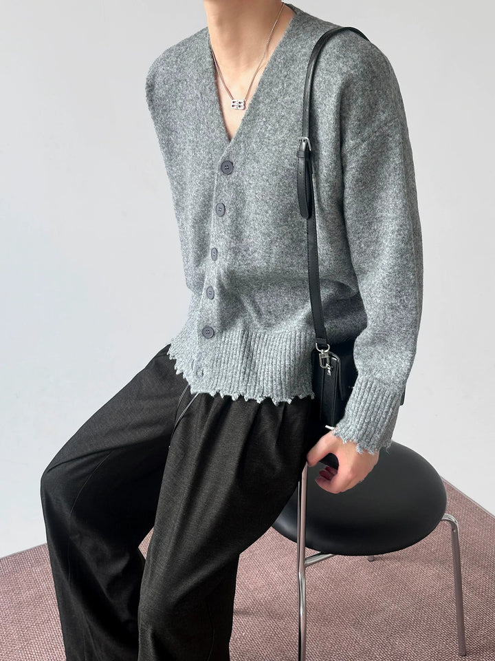 Close-up detail of Distressed V-Neck Knit Cardigan