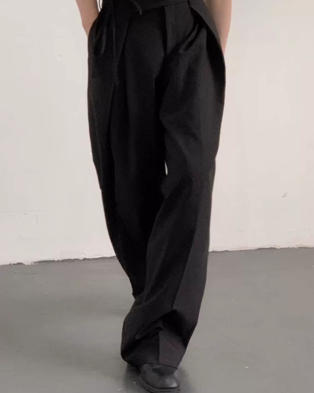 Close-up detail of Pleated Wide Leg Trousers