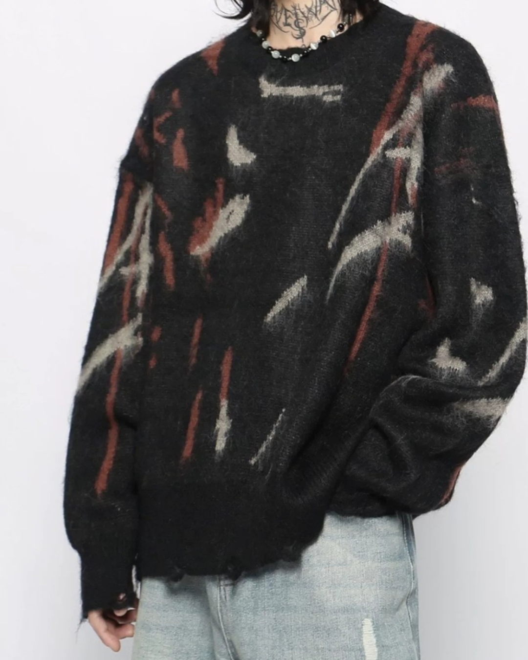 Lifestyle styling view of Distressed Abstract Sweater