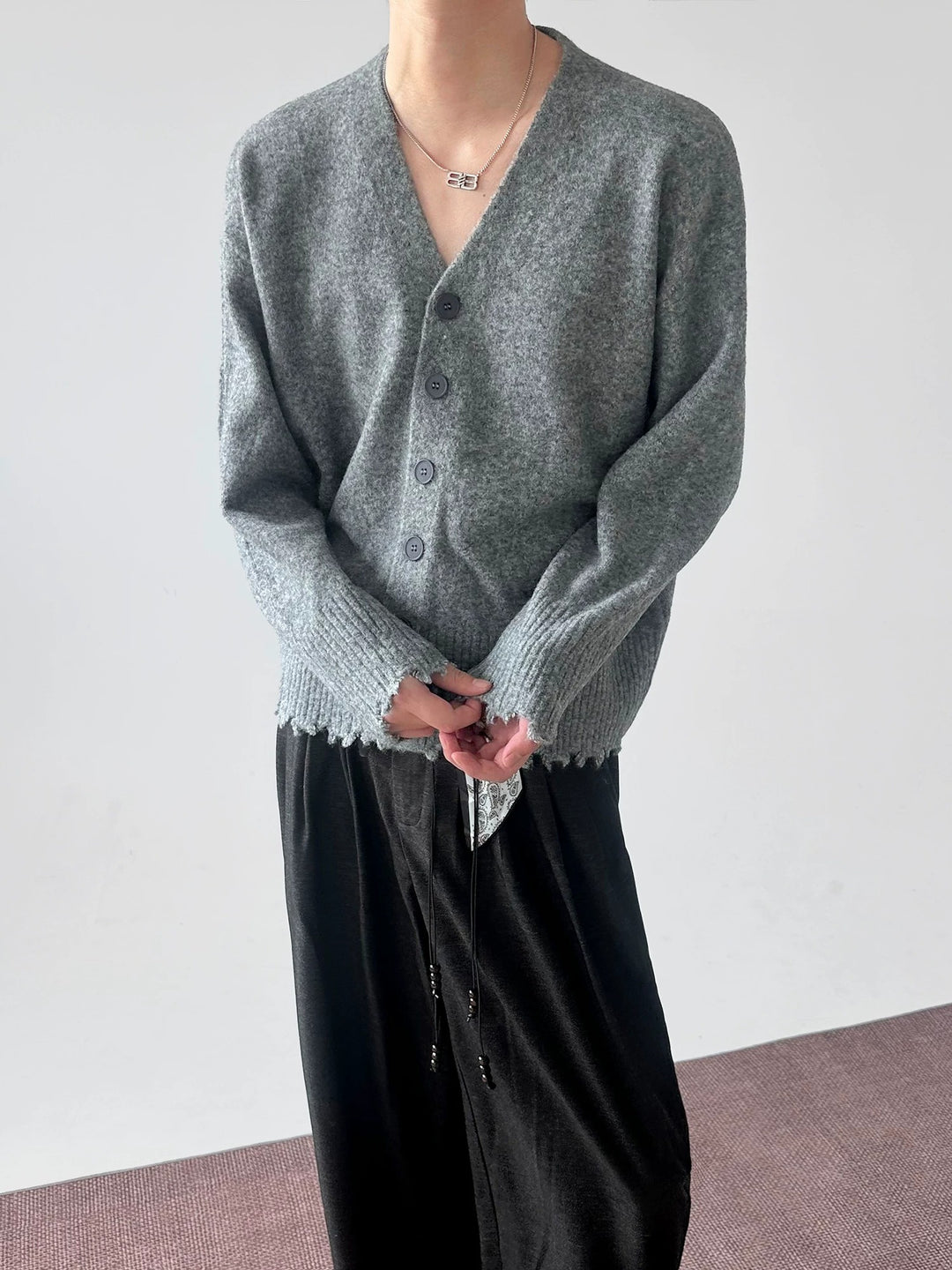Back view of Distressed V-Neck Knit Cardigan