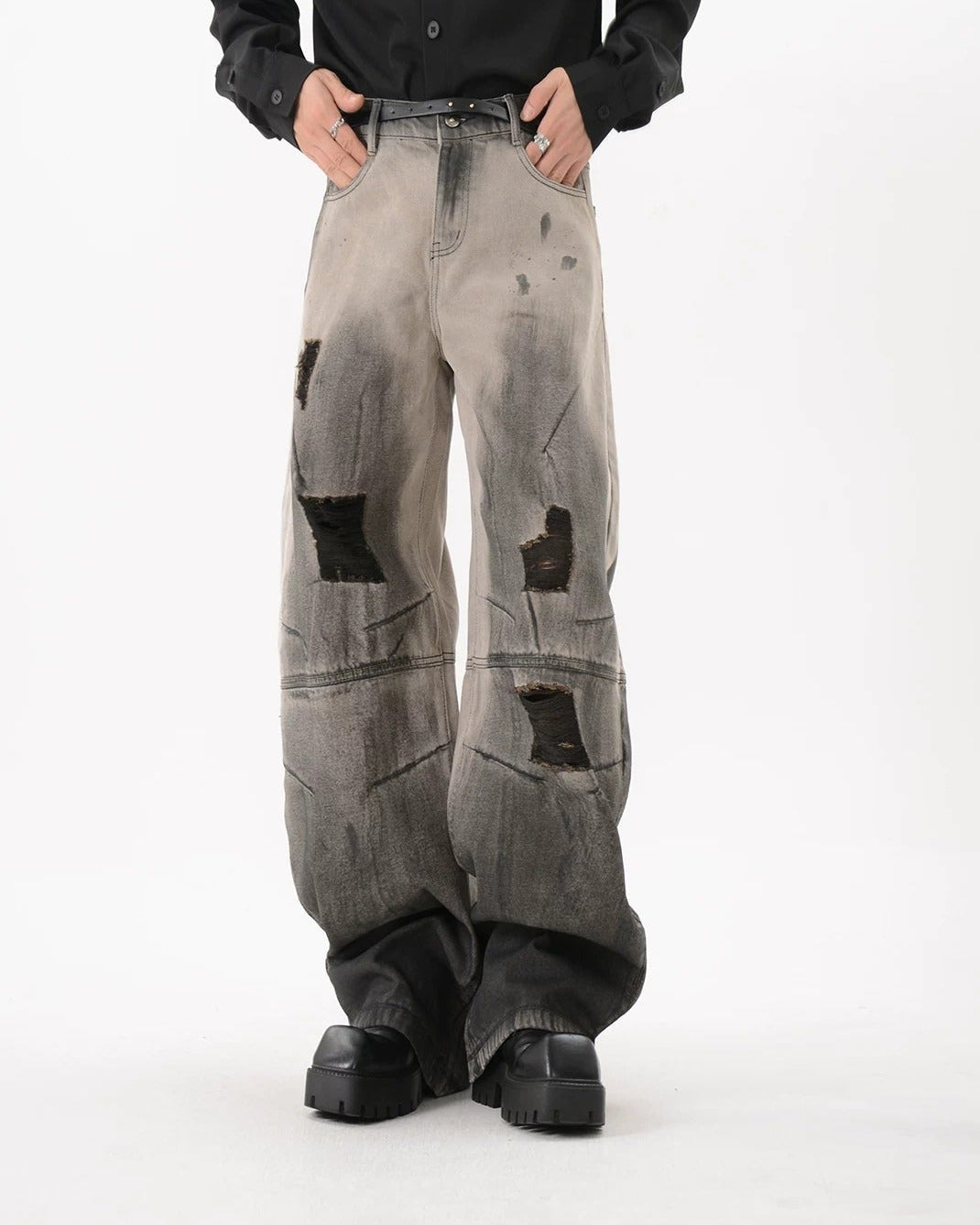 Side view of Black Patch Distressed Baggy Jeans
