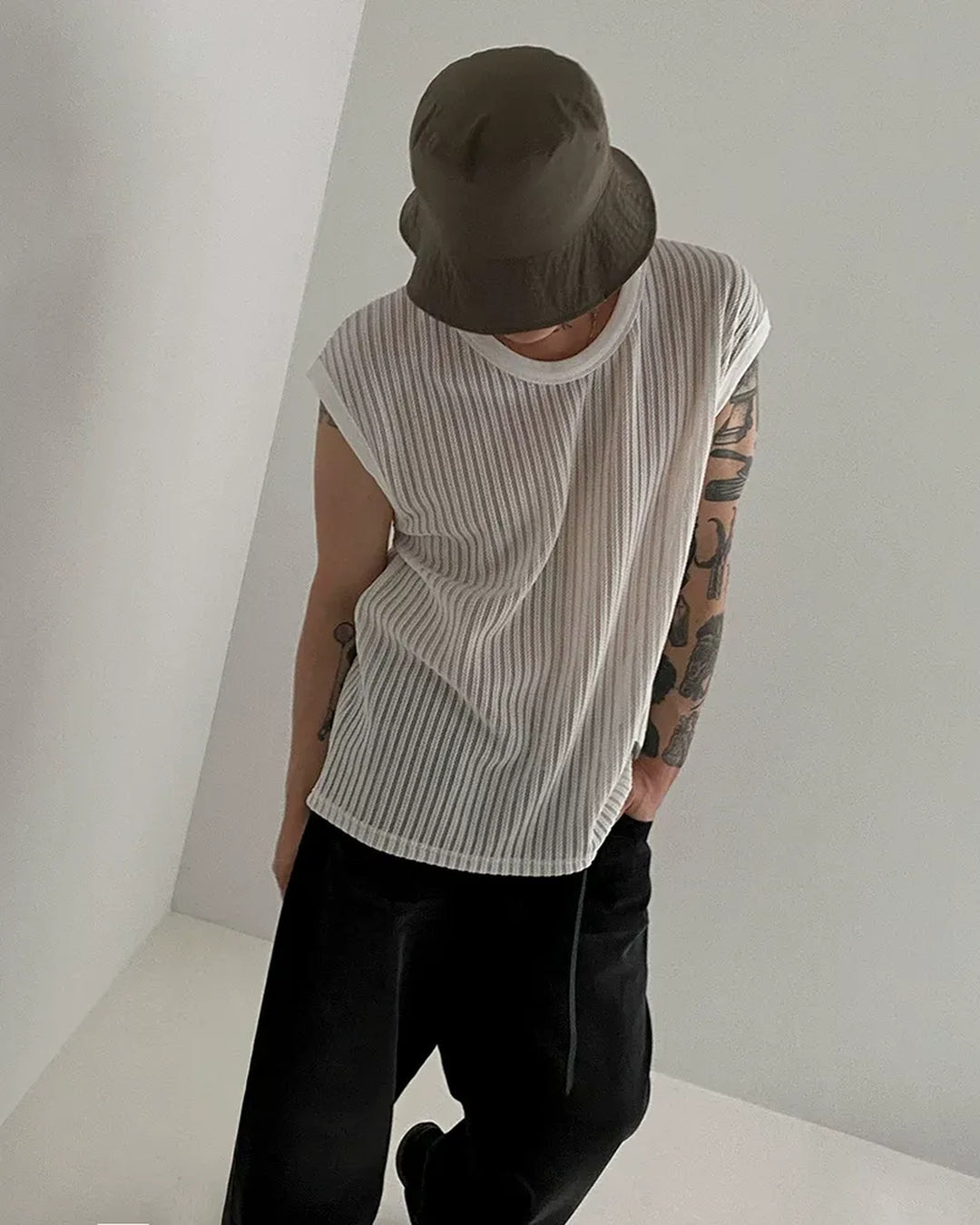 Lifestyle styling view of Sheer Ribbed Sleeveless Tank Top