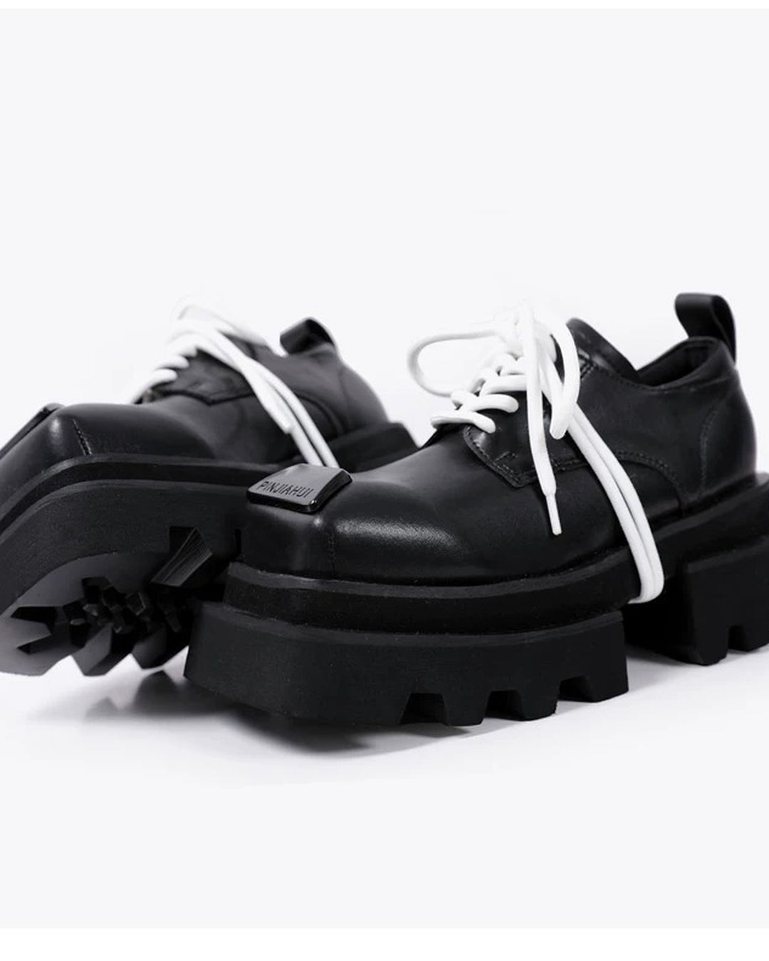 Close-up sole detail of Black Leather Square-Toe Chunky Platform Shoes