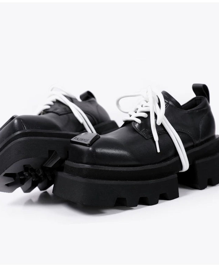 Close-up sole detail of Black Leather Square-Toe Chunky Platform Shoes