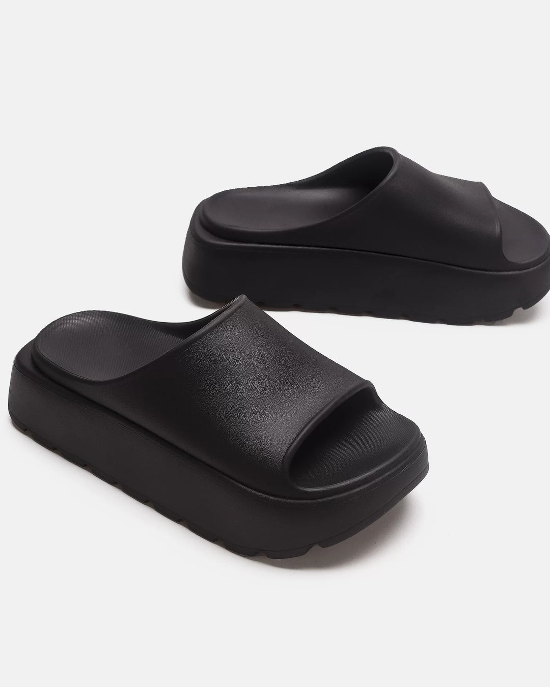 Side view of Black Chunky Platform Slide Shoes