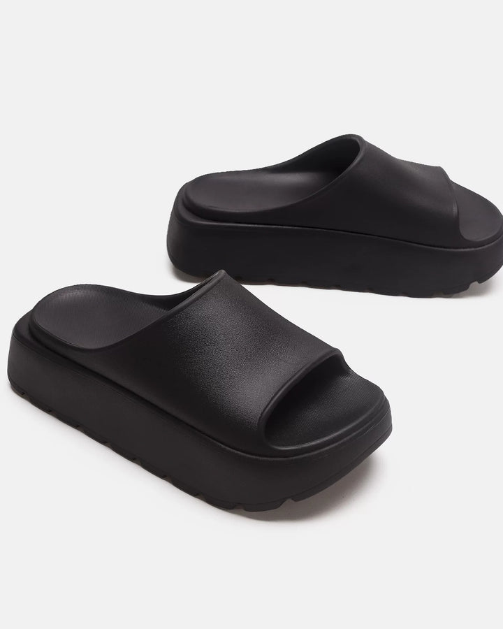 Side view of Black Chunky Platform Slide Shoes