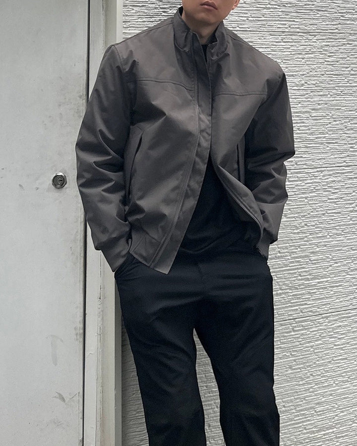 Side view of Minimalist Stand Collar Oversized Bomber Jacket