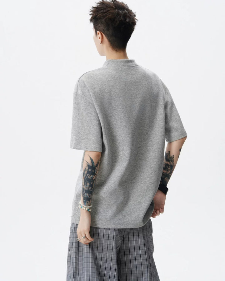 Close-up detail of Henley Neck Oversized T-Shirt