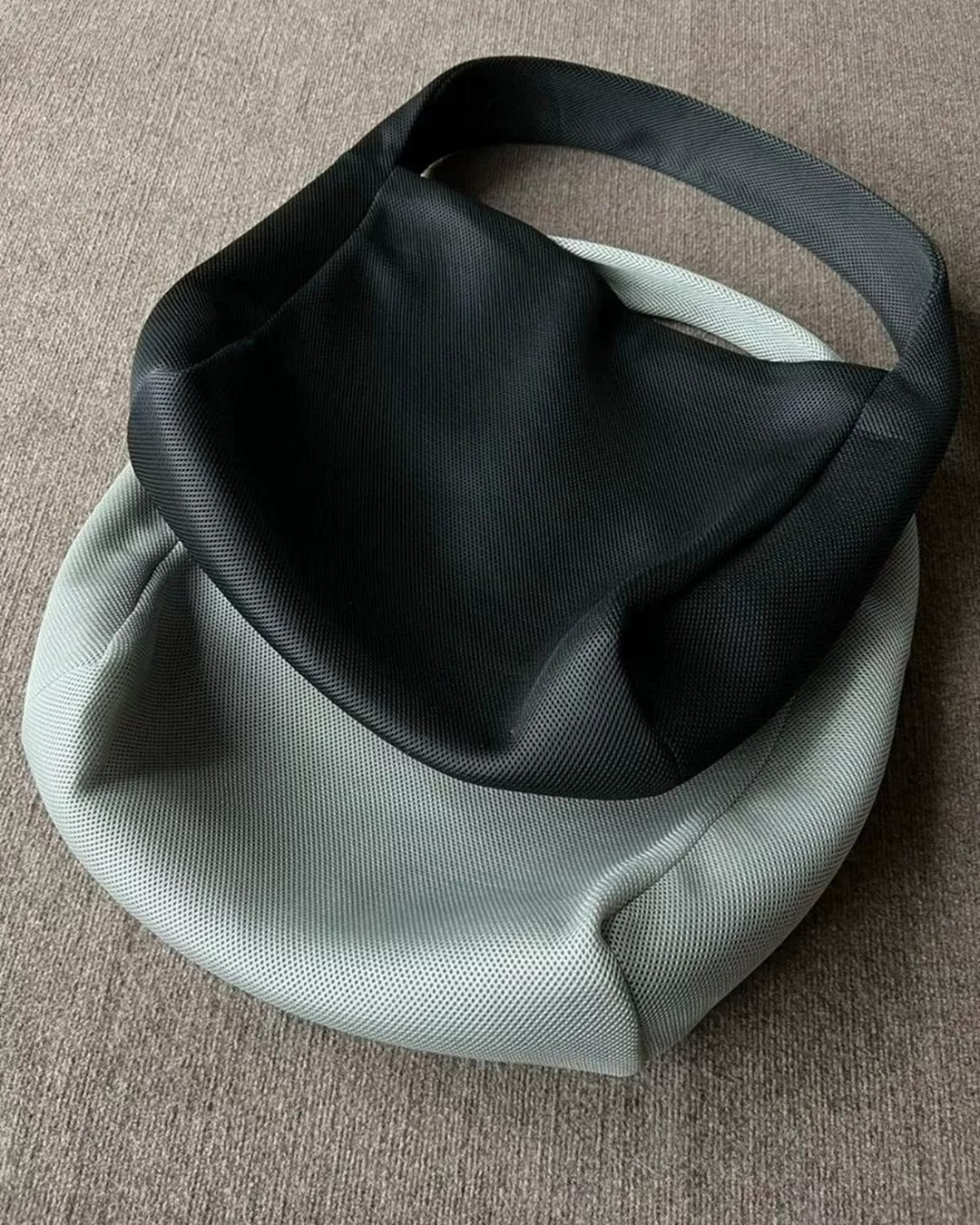Lifestyle styling view of Minimalist Knit Hobo Shoulder Bag