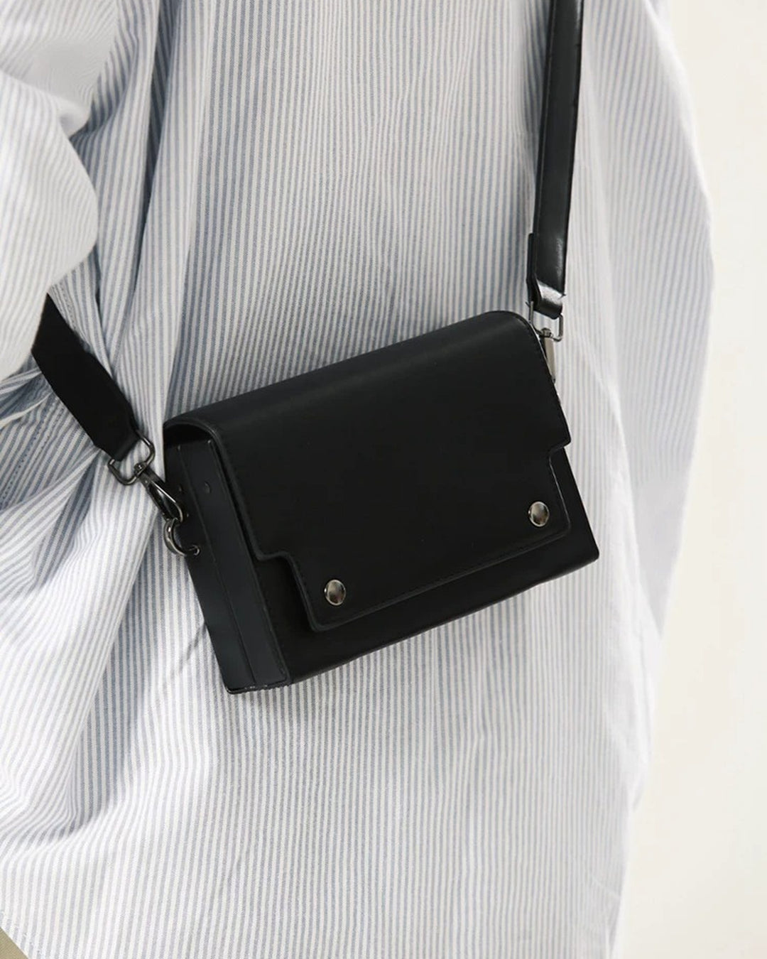 Close-up detail of Minimalist Leather Crossbody Bag