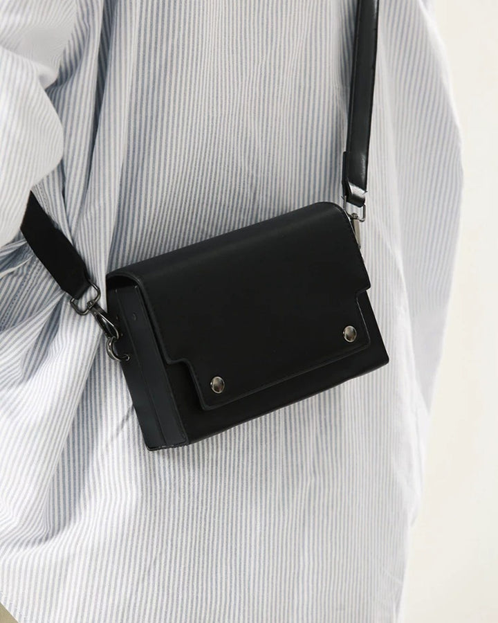 Close-up detail of Minimalist Leather Crossbody Bag