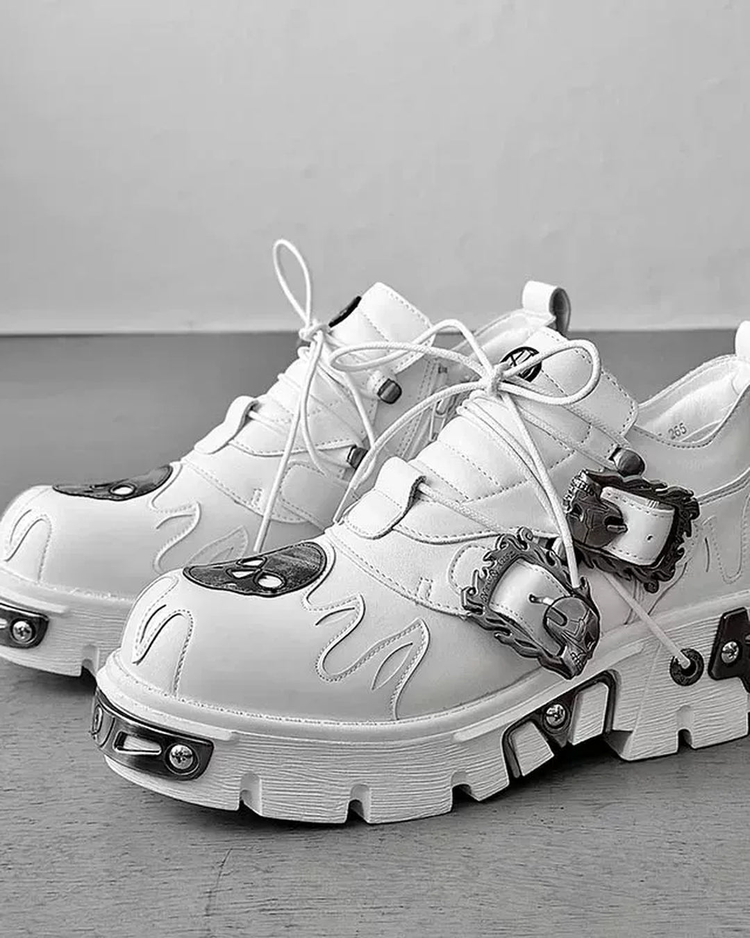 Front view of White and Black Gothic Distressed Shoes