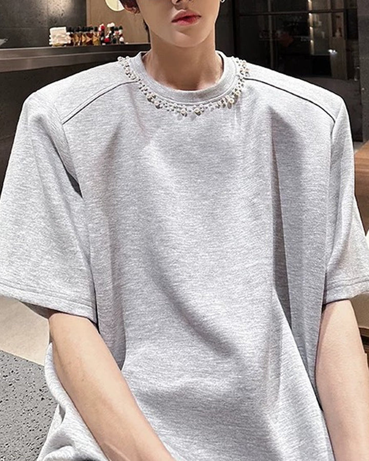 Lifestyle styling view of Oversized T-Shirt with Chain Neck Detail