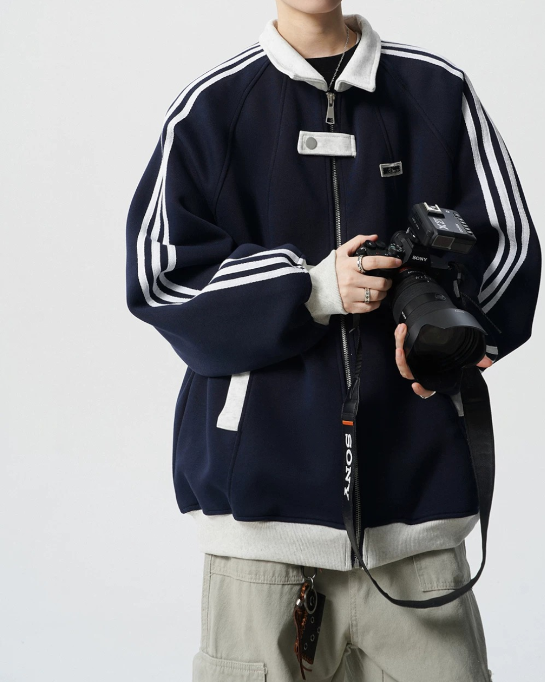 Lifestyle styling view of Minimalist Track Jacket