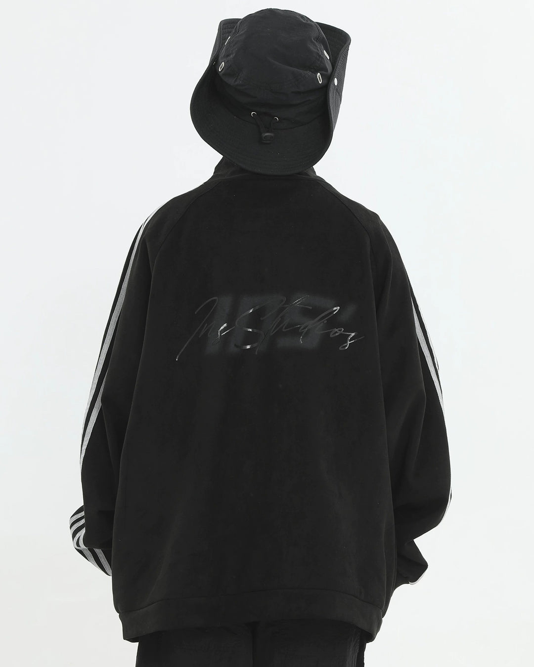 Lifestyle styling view of Striped Sleeve Track Jacket