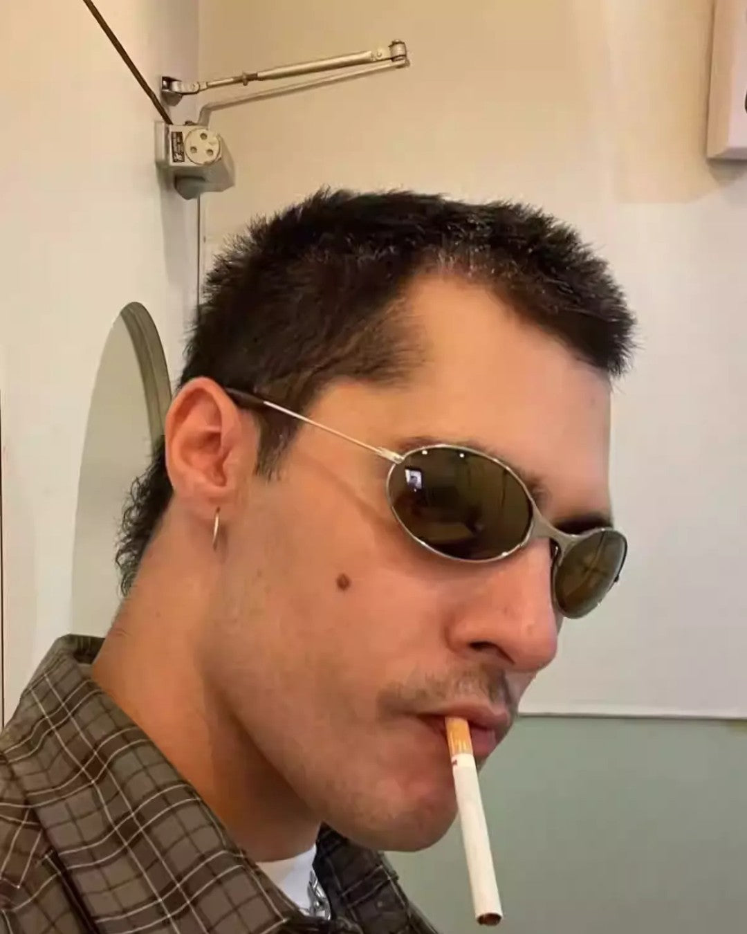 Lifestyle styling view of Oval Retro Sunglasses