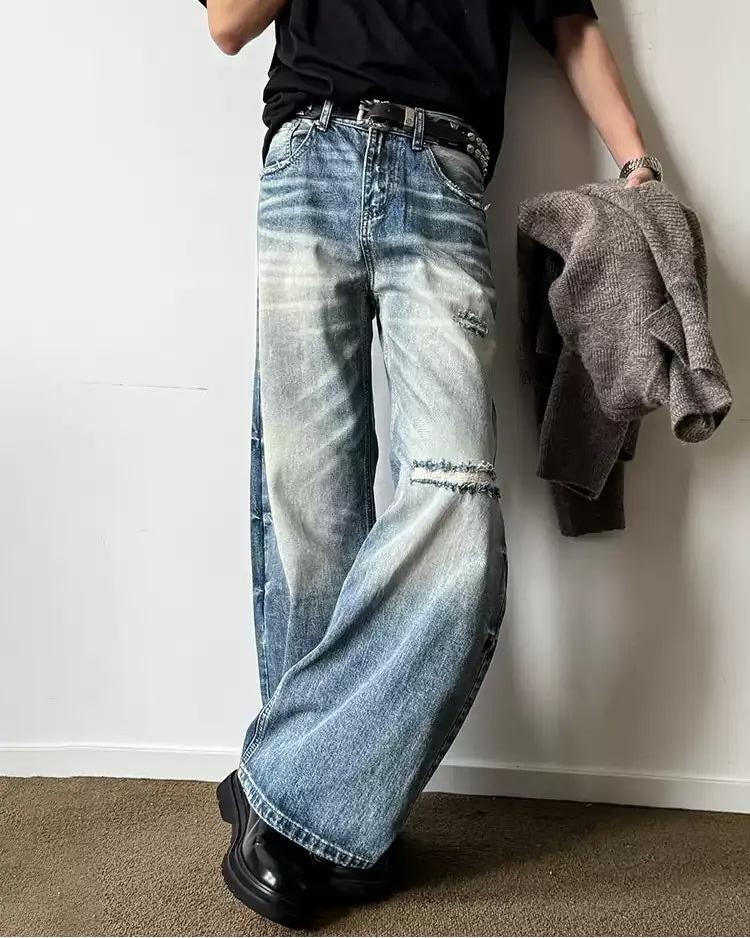 Lifestyle styling view of Light Wash Distressed Baggy Jeans