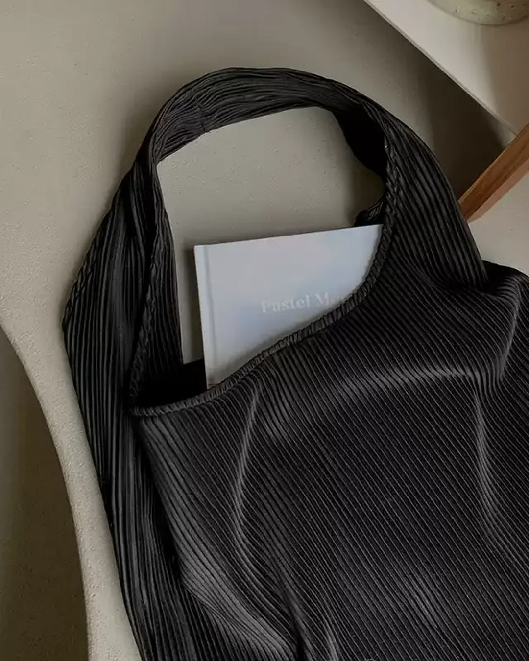 Lifestyle styling view of Oversized Black Woven Tote and Shoulder Bag