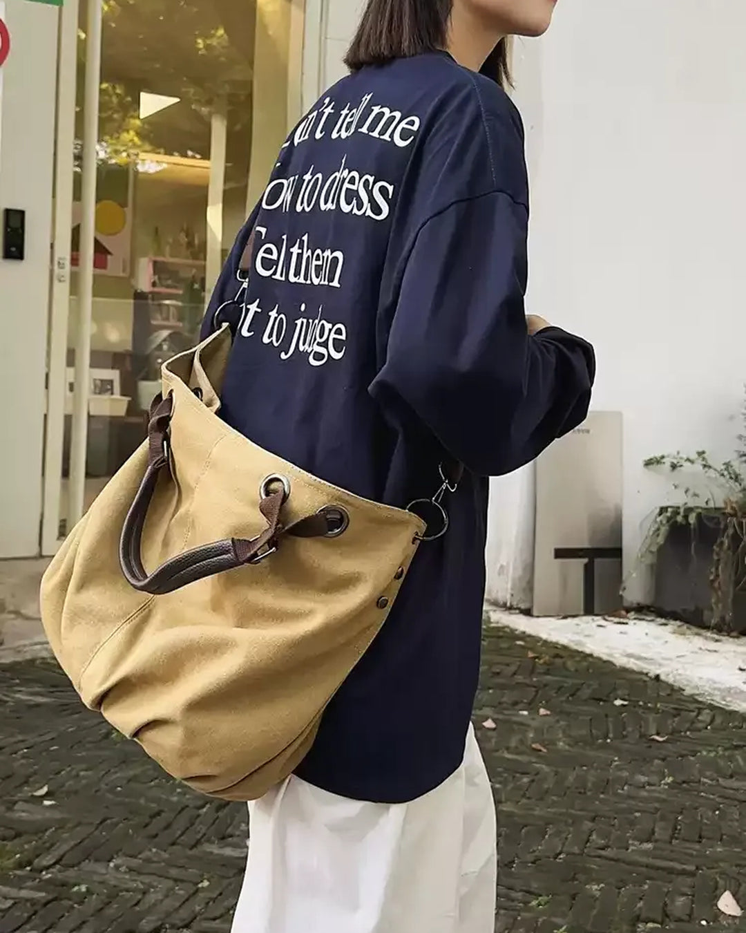 Lifestyle styling view of Canvas Tote Crossbody Bag