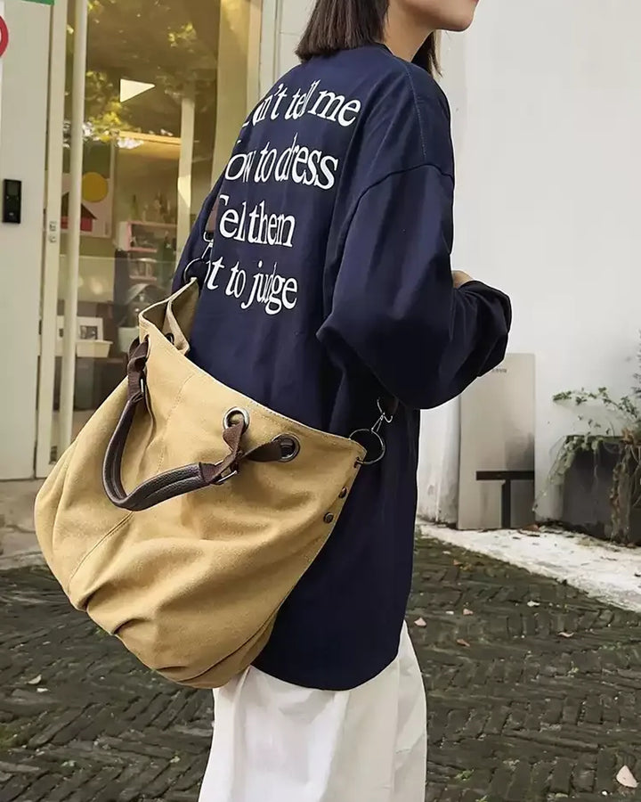 Lifestyle styling view of Canvas Tote Crossbody Bag