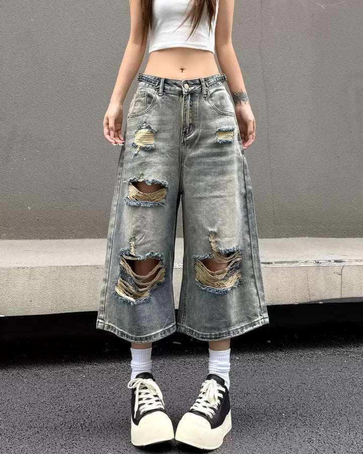 Close-up detail of Distressed Ripped Denim Wide Leg Shorts