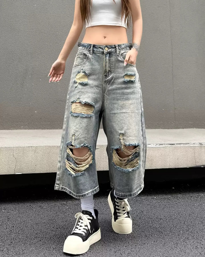 Side view of Distressed Ripped Denim Wide Leg Shorts