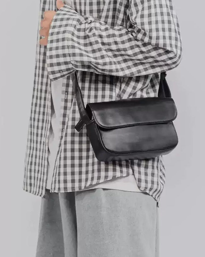 Lifestyle styling view of Retro Minimalist Leather Crossbody Bag