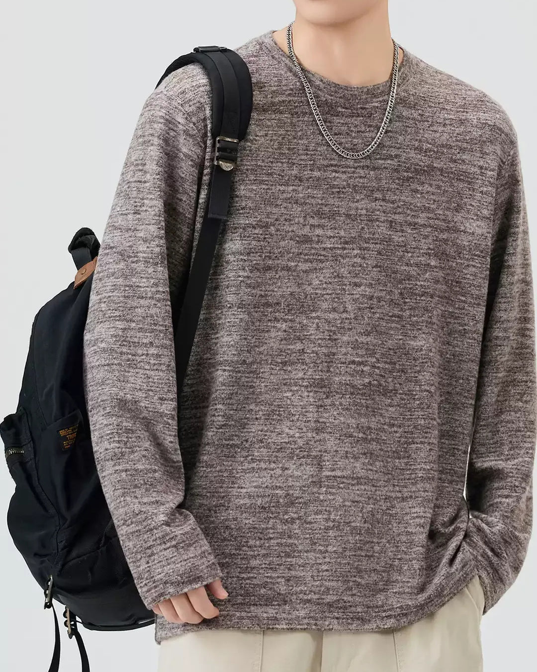 Lifestyle styling view of Washed Crew Neck Long Sleeve T-Shirt