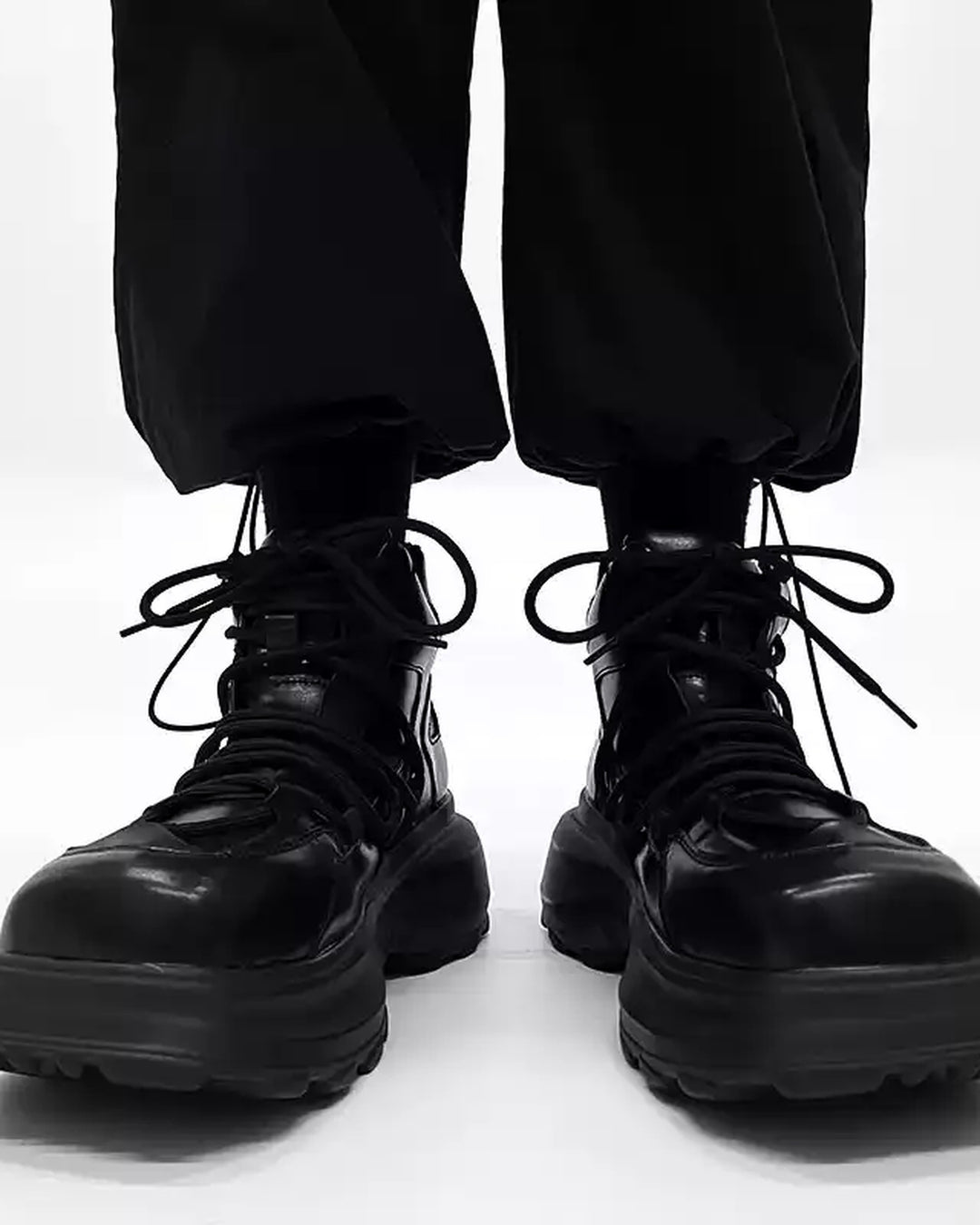 Front view of Black Leather High-Top Chunky Platform Shoes