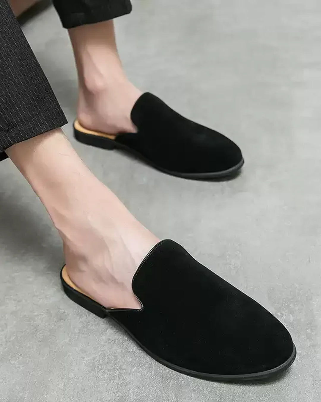 Close-up sole detail of Black Suede Slip-On Shoes