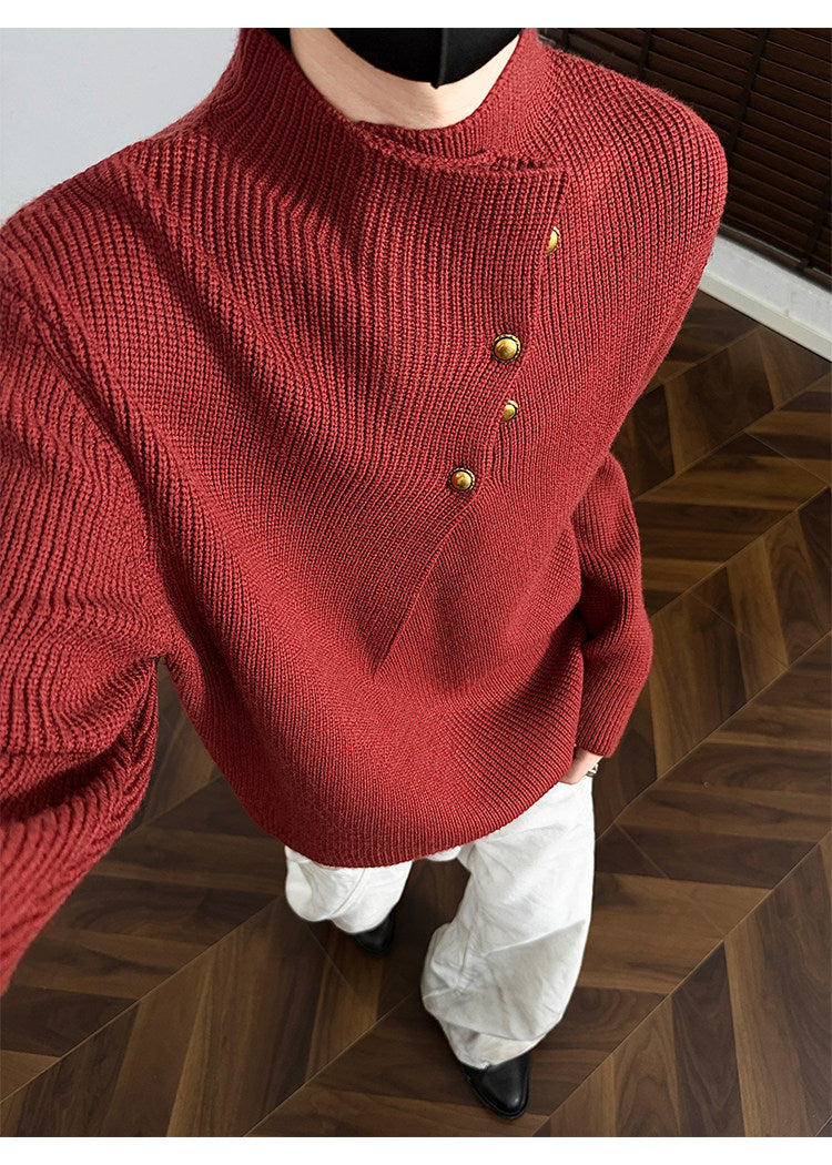 Asymmetric-button knit sweater, close-up view of the red button placket