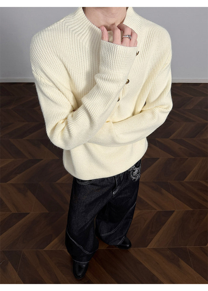 Asymmetric-button knit sweater, front view of the cream sweater