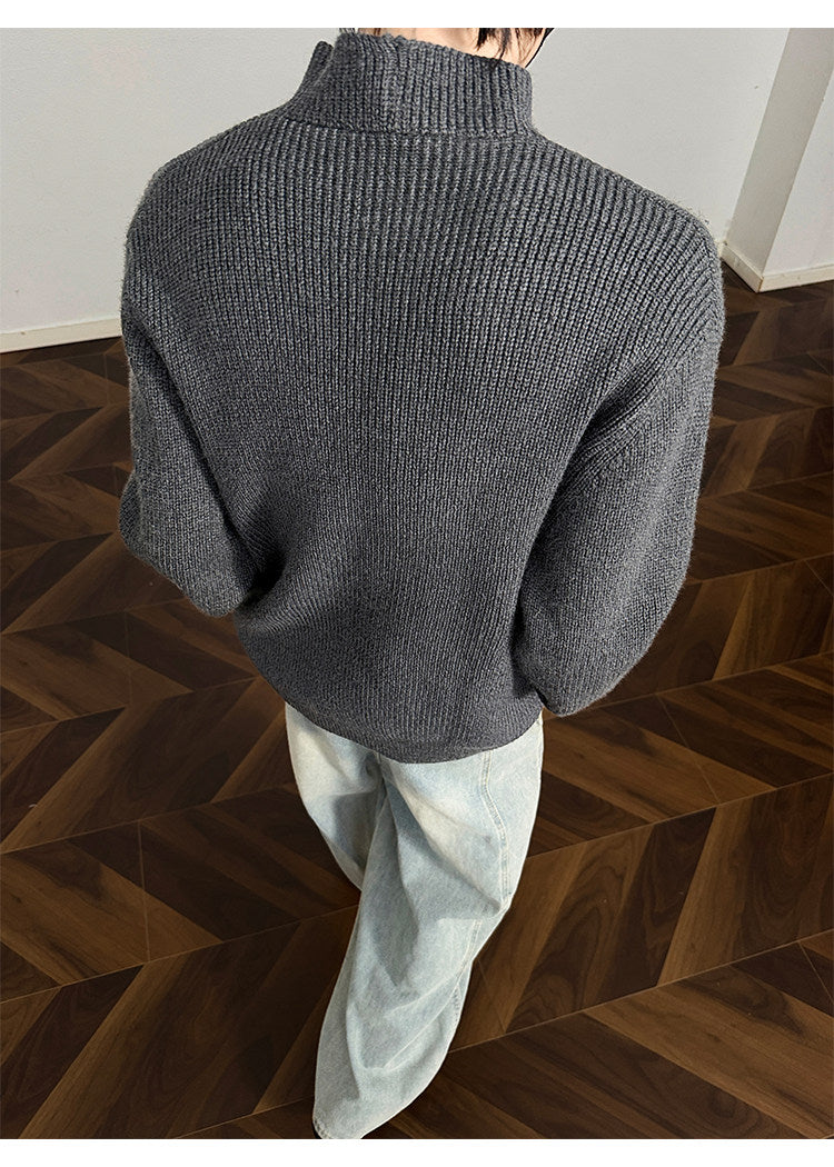 Asymmetric-button knit sweater, back view of the gray sweater