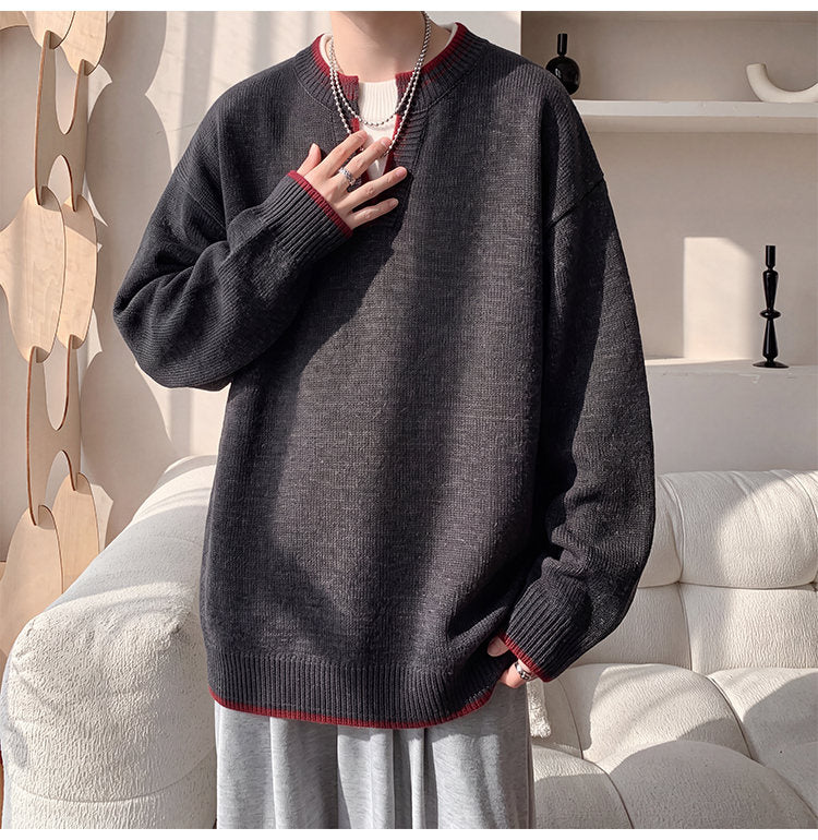 Contrast-trim V-neck sweater, angled view showing the contrast trim