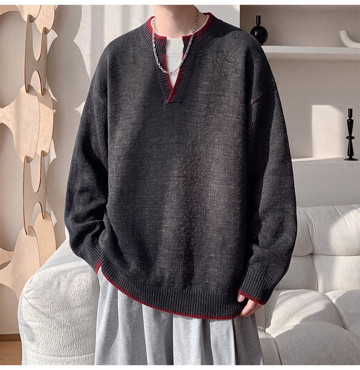 Contrast-trim V-neck sweater, front view showing the red neckline trim