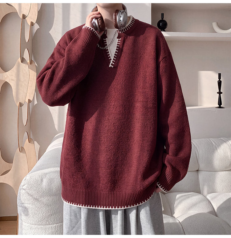 Contrast-trim V-neck sweater, angled view of the burgundy sweater