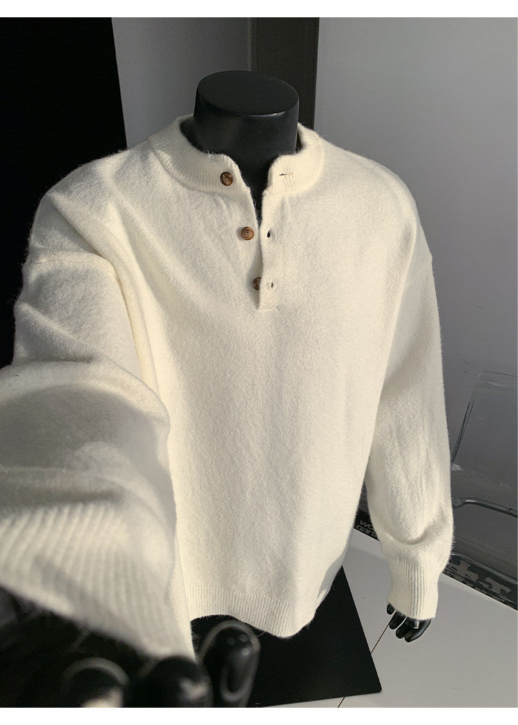Stand-collar button knit sweater, front view showing the cream placket