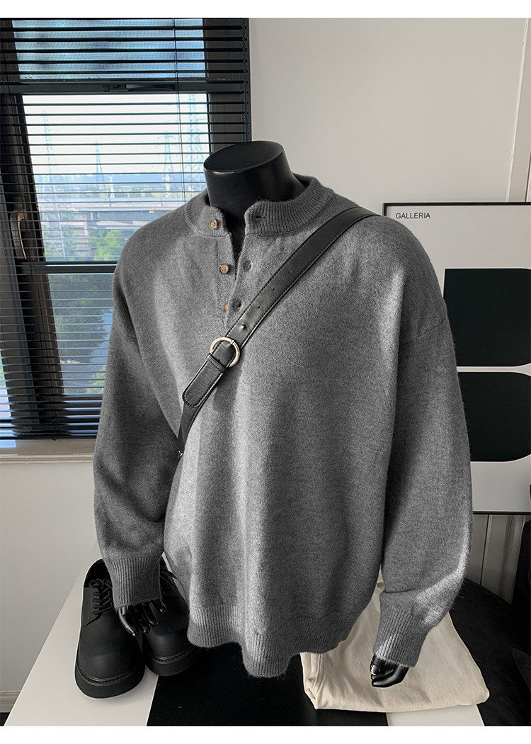 Stand-collar button knit sweater, angled view of the gray sweater