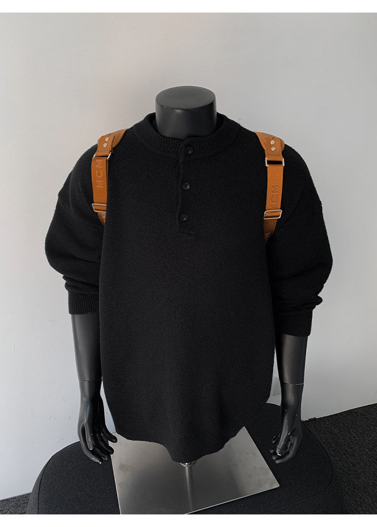 Stand-collar button knit sweater, front view showing the button placket