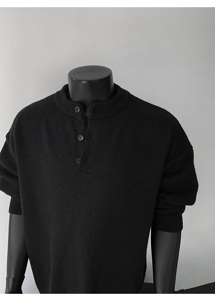 Stand-collar button knit sweater, close-up view of the black collar