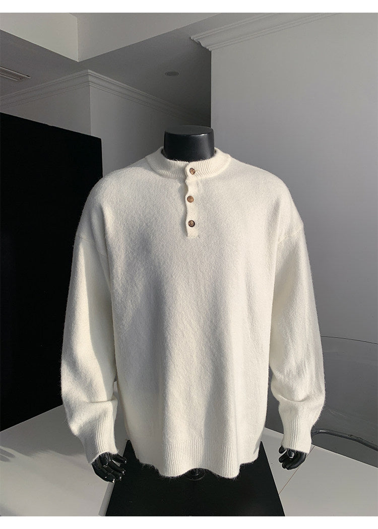 Stand-collar button knit sweater, angled view of the cream sweater